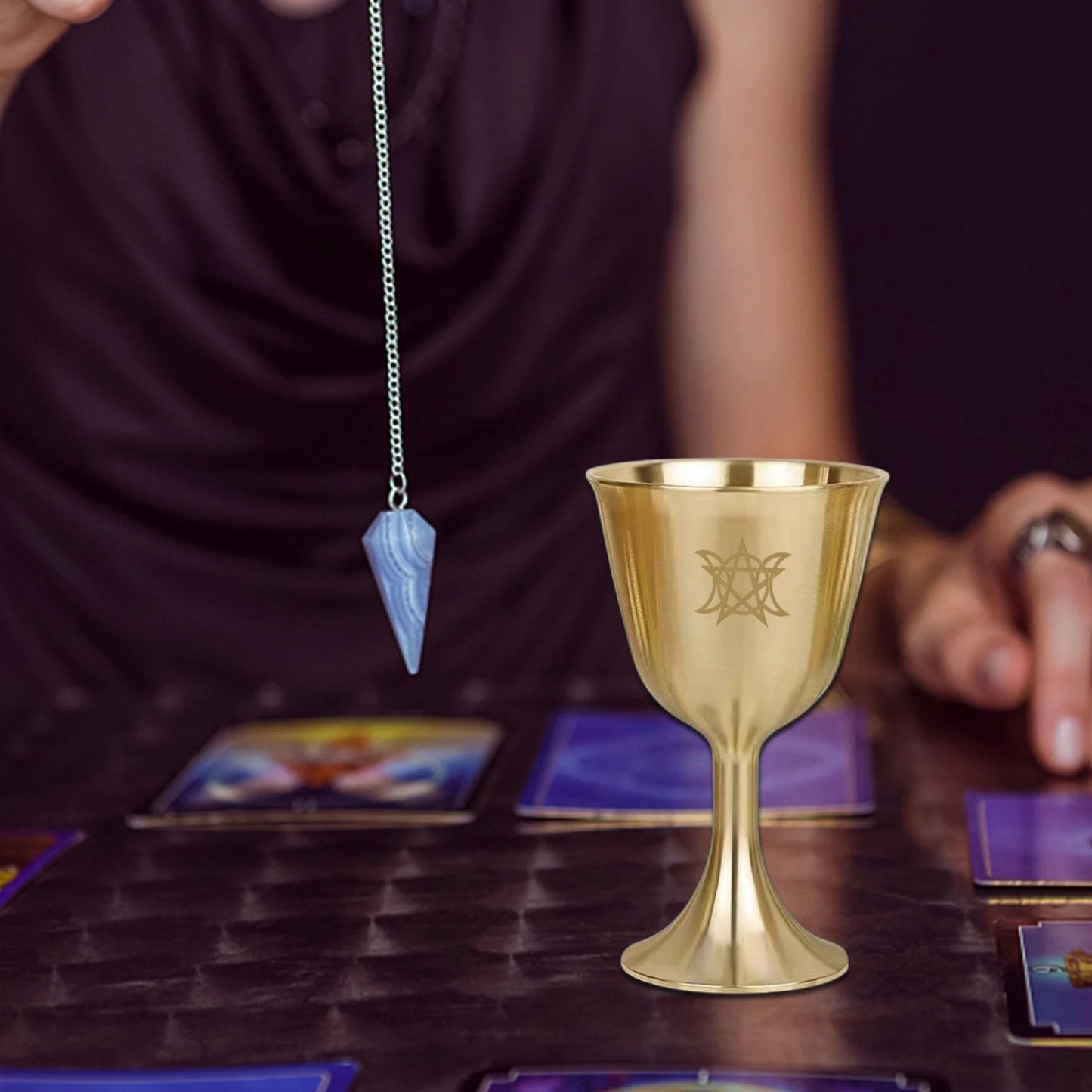 A five-pointed tarot ritual cup