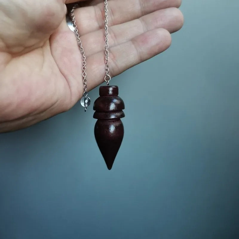 A natural wooden pendulum