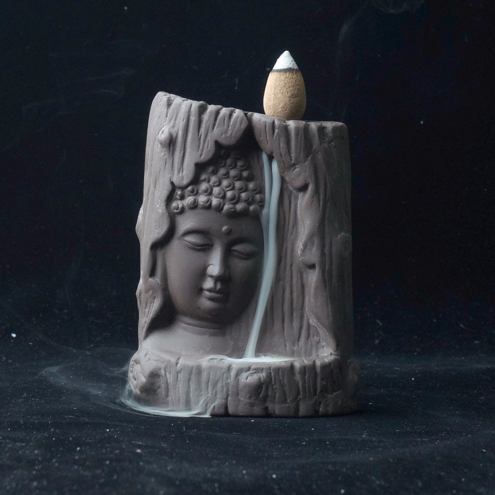 Buddha statue burning incense