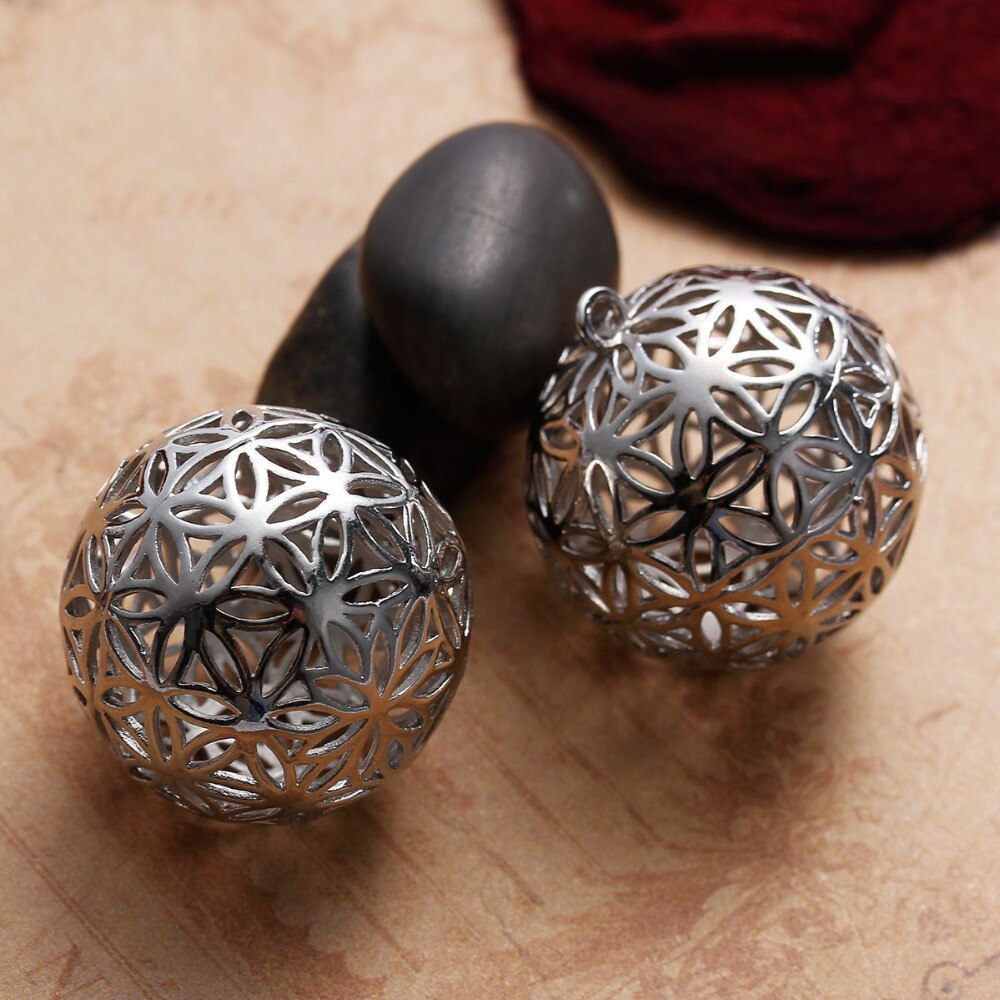 The flower of life pendants are round