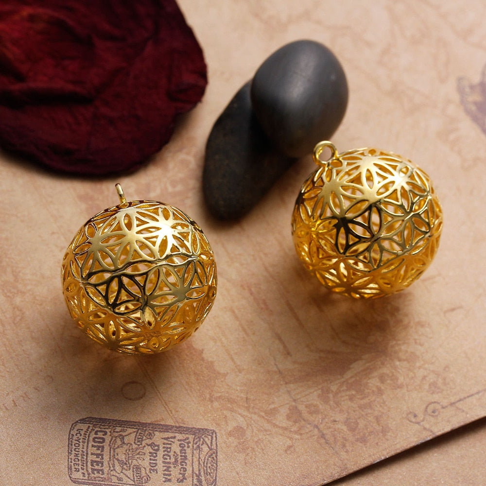 The flower of life pendants are round