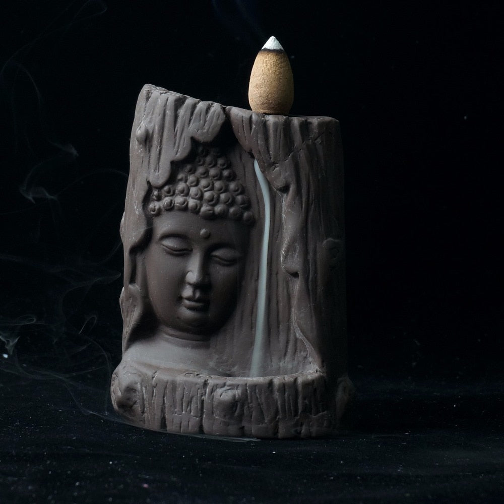 Buddha statue burning incense